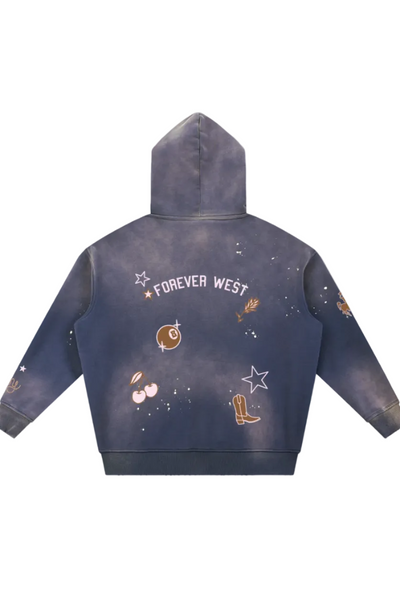 A hooded sweatshirt shown from the back, featuring a dark blue-gray mineral wash with a distressed texture. The back is decorated with a 'FOREVER WEST' graphic in white, accompanied by western-themed illustrations including stars, a cowboy boot, Indian paintbrush, cherries, and an 8 ball.