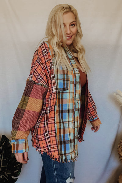 favorite oversized flannel with all the best details. Super fun blue, orange + red plaid patchwork details. That tattered hem we all love gives it an edgy feel. Oversized fit, of course. 
