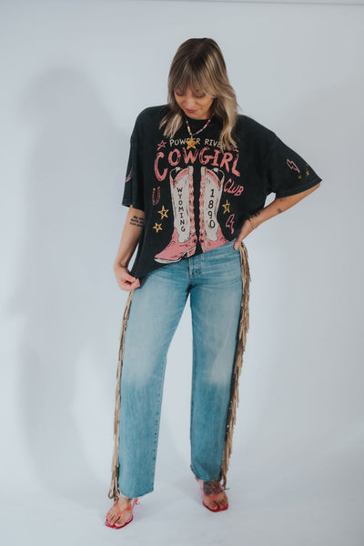 black graphic t-shirt with 'Powder River Cowgirl Club' text and a wyoming-themed print