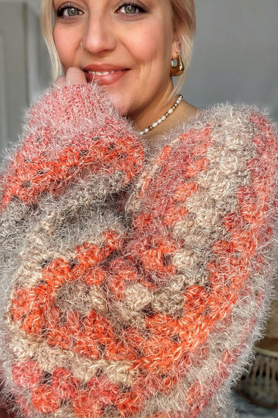 The most gorg hand crocheted chunky knit cardigan. The most stunning color combo. Oversized fit. Acrylic/nylon blend — SO SOFT. Handmade with love in Casper, WY