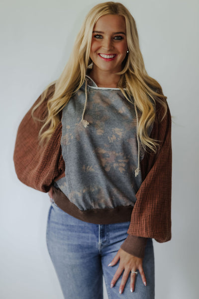 Free people vibes — you already know! This vintage-inspired pullover hoodie has all the best fun lived-in look details. Loving the slouchy + relaxed fit, dolman long sleeves with ribbed cuffs + raw edge seams! It has super rad mineral washed gauze sleeves with a contrasting bleached body.