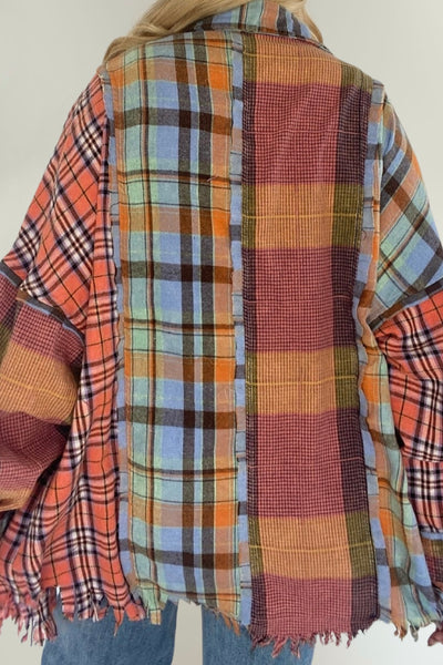 favorite oversized flannel with all the best details. Super fun blue, orange + red plaid patchwork details. That tattered hem we all love gives it an edgy feel. Oversized fit, of course. 