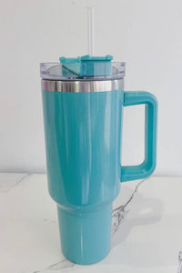 The perfect cup to help you get your daily water intake, a 40 oz. tumbler! They are easy to clean, leak-proof + designed to keep drinks either hot or cold for extended periods of time! A wildly popular choice for those who want a reliable + stylish tumbler for everyday use. Super fun teal color.