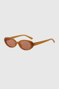 The perfect sunnies. These Dazed Babe Sunnies feature a coveted small oval frame that add the perfect flare to any look. Fun + super on-trend, Taya is available in black, torte + caramel.