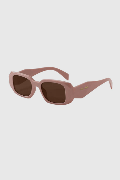 These sunglasses feature a gorgeous multi-faceted frame + angular temples. Sophisticated + effortlessly on-trend, this one is available in rose beige + black. They feature a high-quality frame with glare-reducing polarized lenses and 100% UV protection.