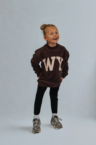 Kids reversible brown Wyo mock neck sweatshirt featuring WYOMING and WY prints