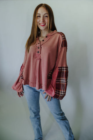 We love a good fabric mix! This top has that + then some with a mix of plaid + waffle knit material along with stunning balloon sleeves + a half button neckline. The rounded hem is stunning + really elevates this piece to the next level! This top has a relaxed fit + is jam packed with cool details. Roomy fit - if between sizes, you can size down. 