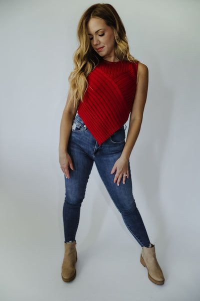 sweater tank ribbed to perfection with a scarf hem + crafted from a lightweight knit fabric, this stretchy top has a rounded neckline and a v bottom hem. Enjoy all-day comfort while looking stylish + chic.