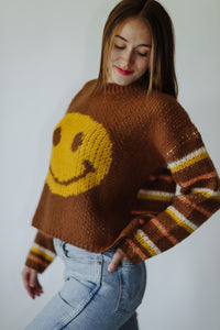 Y’all know I have a thing for smileys, but also how dang fun would this be for a Wyoming  football game?! I couldn’t resist. All the best details of course — Cutest statement smiley face design across the front as well as a fun, bold striped design along the sleeves + backs. 