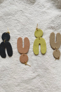 textured clay arch earrings.