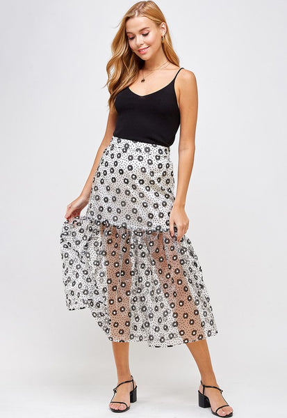 Sheer mesh midi skirt. Floral pattern. Black and white.