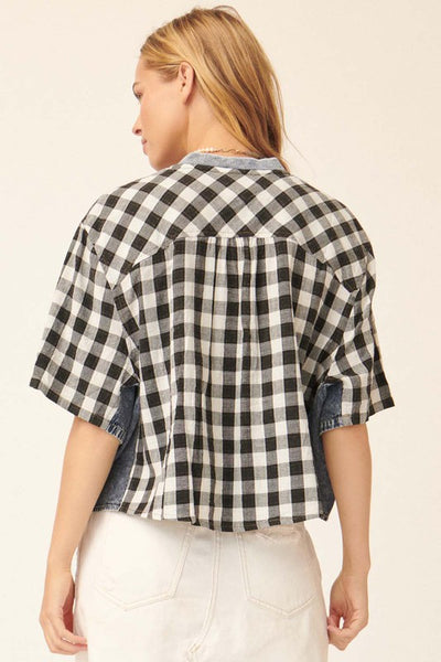 flattering on every body type gingham blouse. denim contrast detailing. front zipper. chest pockets.
