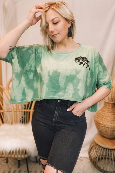 buffalo design. oversized crop fit. sage wash hand dyed fabric. exposed seam detailing. hand stamped with love in Wyoming. relaxed, boxy fit. mustard seed.