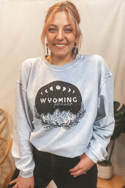 Wyoming forever graphic featuring boho Tetons backdrop. Corded Crewneck.