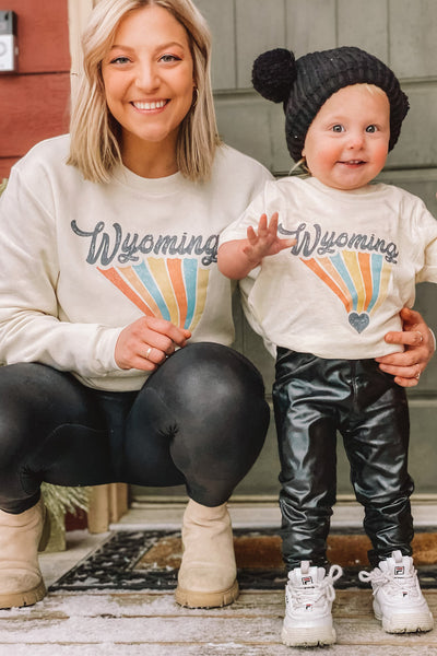 mommy and me. twin with your mini. retro Wyoming crewneck with tornado rainbow graphic 